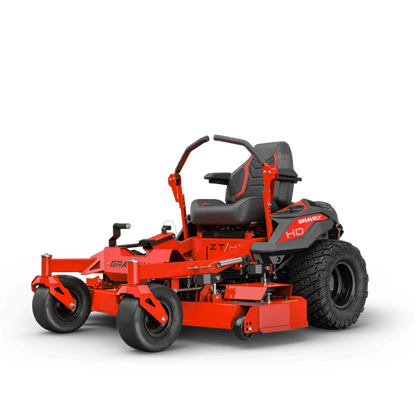 Red and black riding lawn mower on a white background