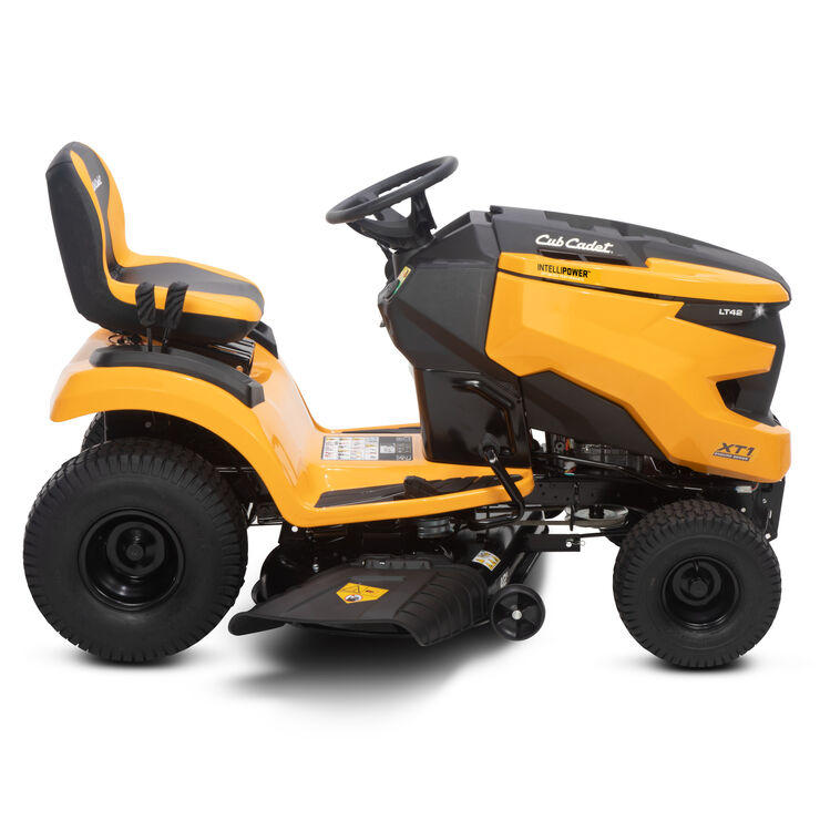 Yellow and black Cub Cadet lawn tractor on a white background