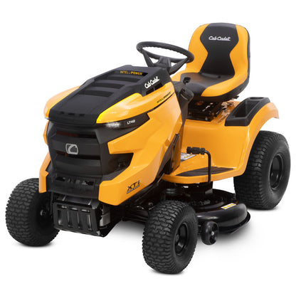 Yellow and black Cub Cadet lawn tractor on a white background