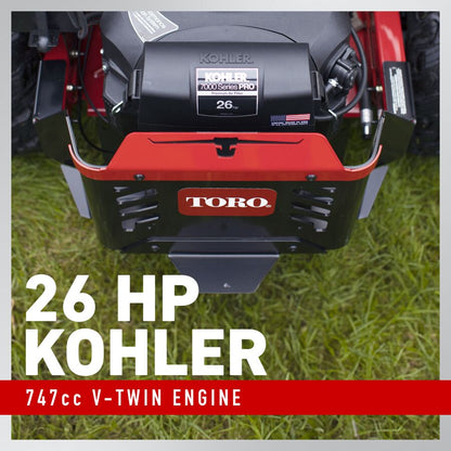 Toro lawn mower with Kohler engine on grass