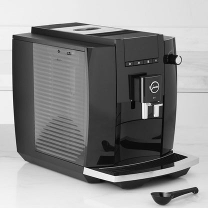 Black coffee machine on a white background