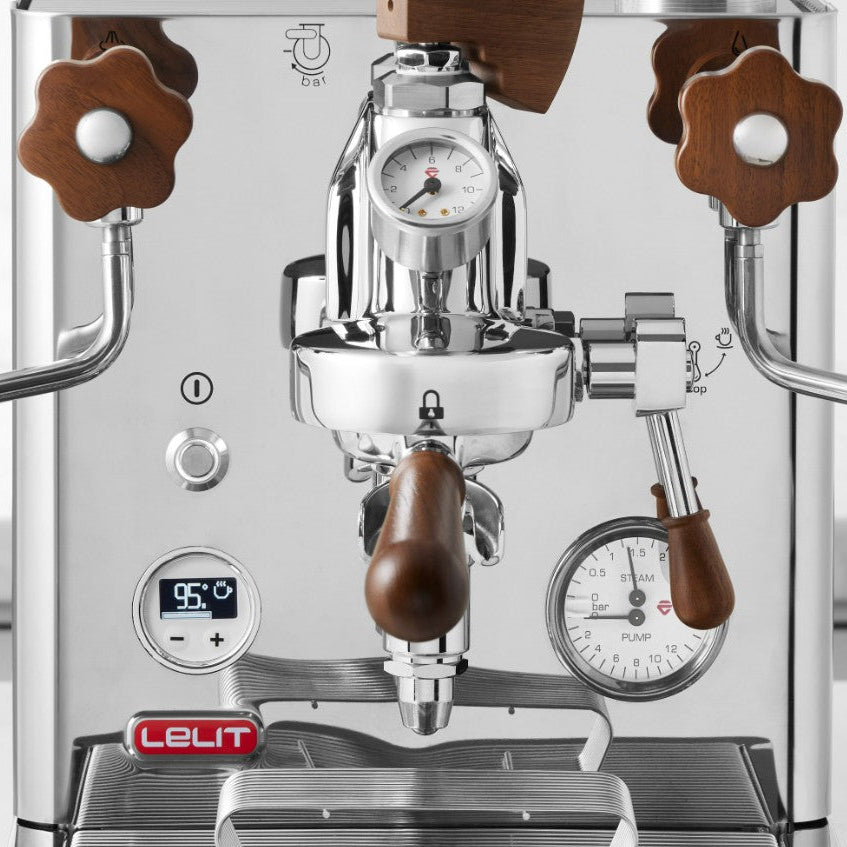 Close-up of a Lelit espresso machine with wooden handles and digital display.