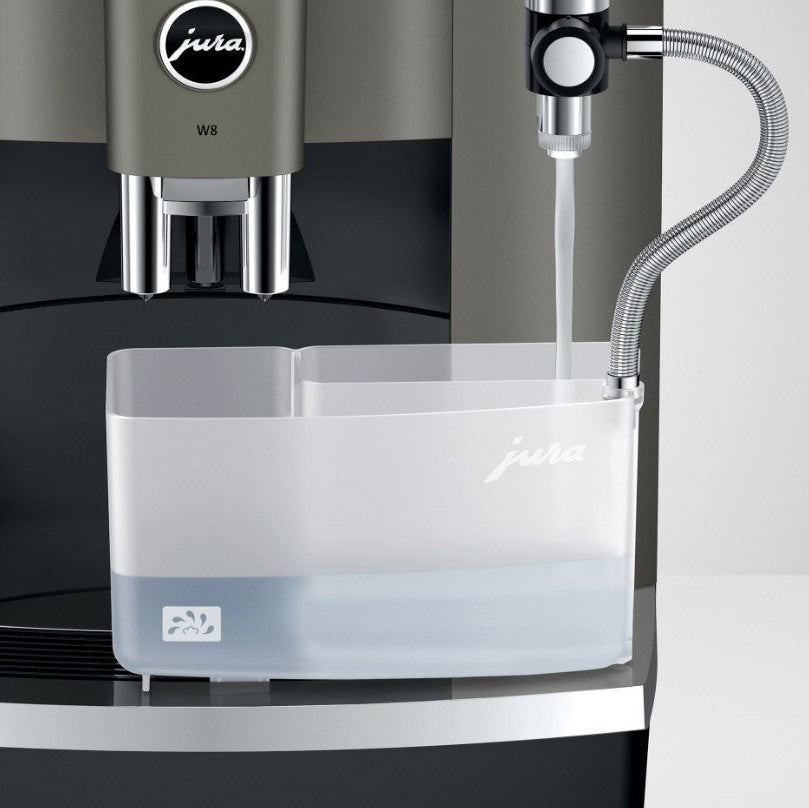 Jura coffee machine with water tank on a black background
