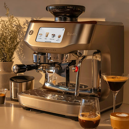 Breville coffee machine with glasses of coffee on a countertop