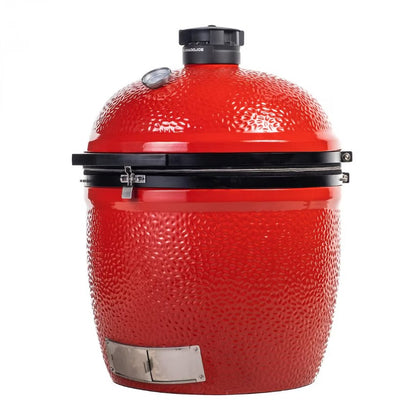 Red ceramic barbecue grill on a white background