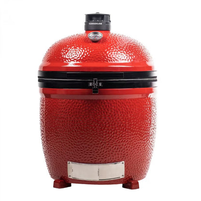 Red Kamado Joe grill on a white background