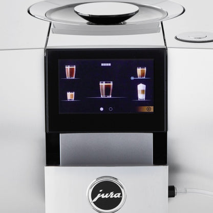 Modern coffee machine with digital display and 'Jura' branding on a white background