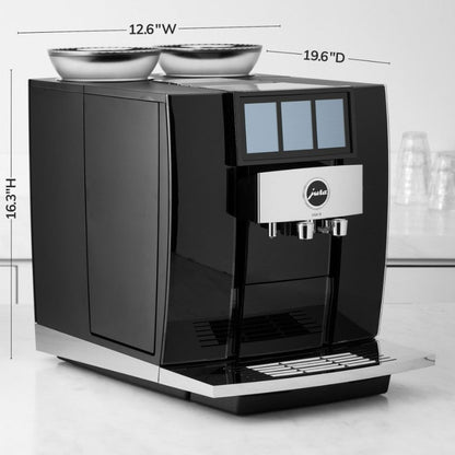 Black coffee machine with dimensions displayed on a white background
