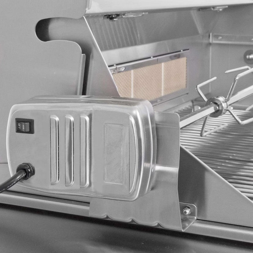 Close-up of a metal machine component with a power cord plugged in.