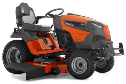 Orange and black riding lawn mower on a white background