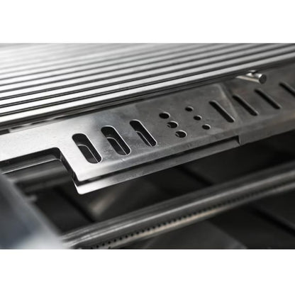 Close-up of a metallic running board on a vehicle