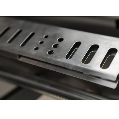 Metallic grill grate on a blurred background