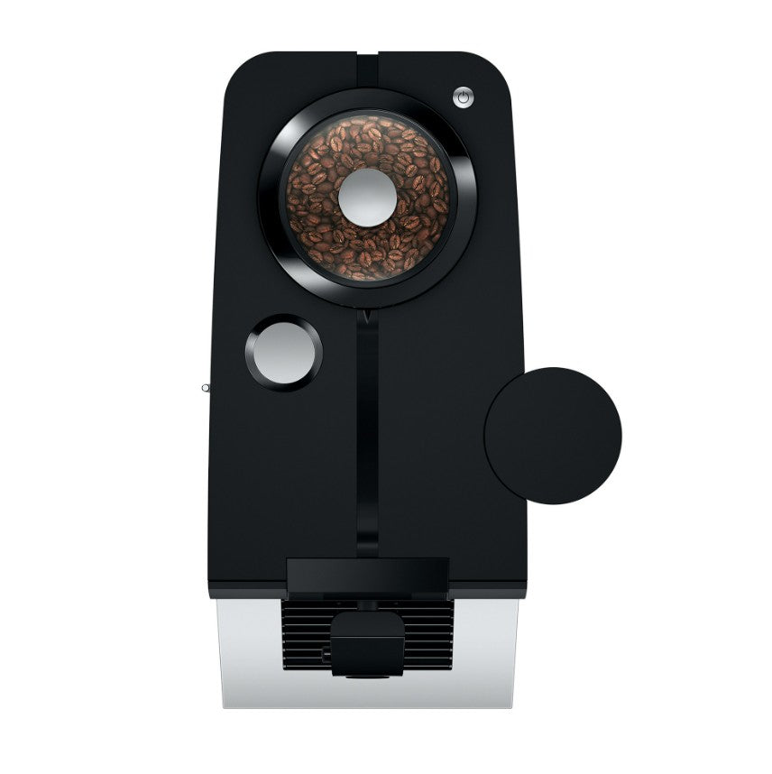 Black coffee grinder with coffee beans on a white background