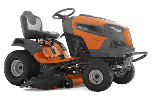 Orange and black riding lawn mower on a white background